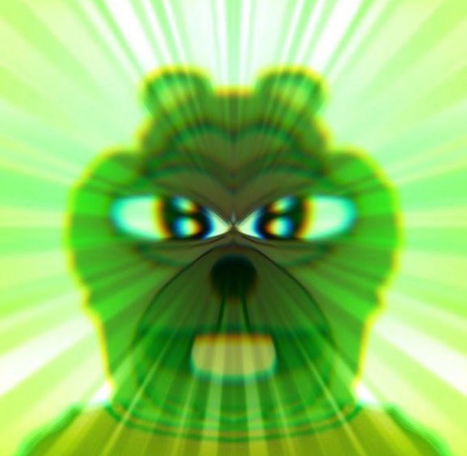 A stylized, exaggerated green teddy bear face is mirrored symmetrically to create a fierce, intense expression with narrowed eyes and bared teeth, set against a radiating green and yellow sunburst background. The aggressive, "bearish" expression with its bold green hues playfully subverts the post's claim of a "bull market," creating ironic visual tension.