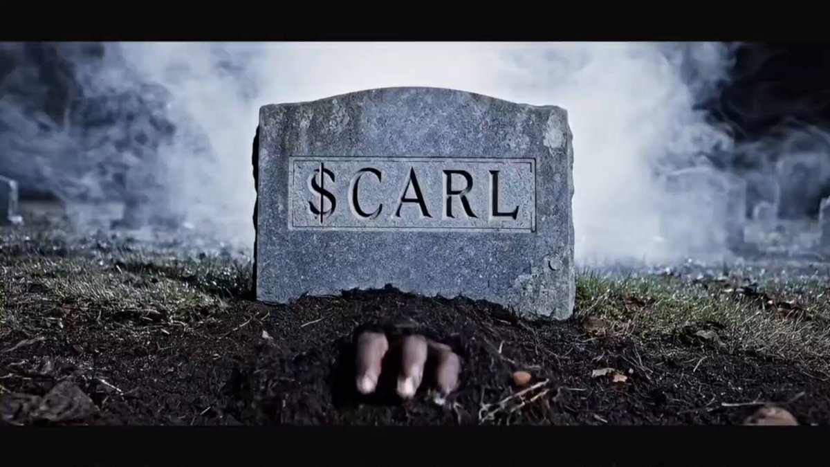 The image features an old, weathered stone headstone with the name "Carl" carved into it. The headstone sits in a cemetery surrounded by fog, giving the scene a mysterious atmosphere. Below the headstone, there's a caption that reads "Good Morning and Happy Saturday! Now i know it'S been a while but... $XRP IS THE STANDARD & $CARL is back!! Hell YEAH!!!". The caption seems to be related to the image of the headstone in some way.