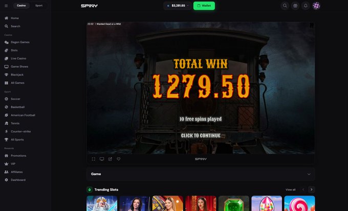 A screenshot of the SPINV casino website displays a "TOTAL WIN 1279.50" message on the "Haunted Dead or a Wild" slot game, showing "10 free spins played." This aligns with the post, which celebrates receiving a 1.2k payout from the platform as a reason for buying 5 SOL worth of the $SPINY token.