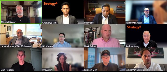 A grid of video conference participants, including Michael Saylor, Chaitanya Jain, Phong Le, and other industry professionals, under the 'Strategy' brand.