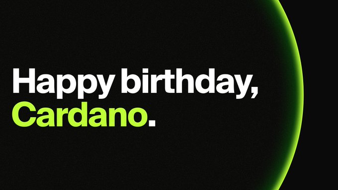 A graphic with a black background and green spherical accent reads 'Happy birthday, Cardano.' in white and green text.