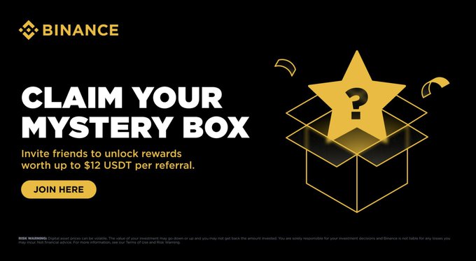 The image features an advertisement for a Mystery Box that has been opened by someone named "Binance". The box contains a gold star with a question mark, which appears to be the key or code needed to open the box. The text on the image encourages people to join and share their links so that others can benefit from the rewards of the Mystery Box.