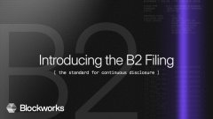 The image features an advertisement that reads "Introducing the B2 File" followed by a blue line through the text, creating a visually appealing contrast of colors. The background of the image has a darker shade than usual, which appears to be part of the advertisement's visual design. Below the central title, there is white text stating "the standard for continuous disgorgee". The image also includes the name "@Blockworks" in a stylized font and "Transparent financials Capital markets We are very happy to work with @Blockworks introducing a new standard for ... protocol transparency." This text serves as an explanation of the content depicted in the image.