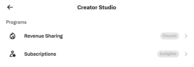 A Creator Studio mobile app screen showing Programs with Revenue Sharing marked as Paused and Subscriptions marked as Ineligible.