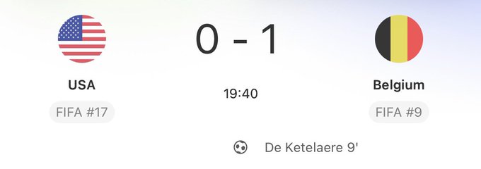 The image shows a soccer match scoreboard with the USA (FIFA #17) trailing Belgium (FIFA #9) 0-1 at 19:40, with De Ketelaere scoring in the 9th minute. The scoreboard reflects the post's message about "Just wait until they come on," highlighting Belgium's early lead over the lower-ranked USA team.