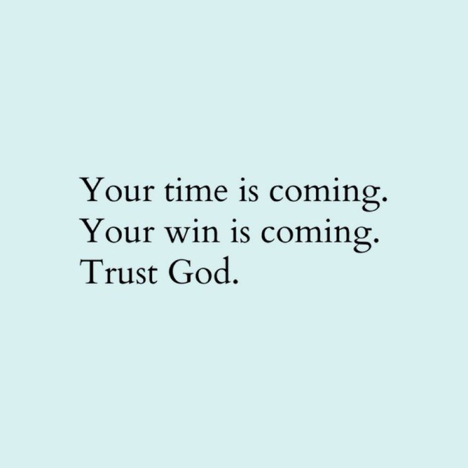 A light blue motivational graphic with black text reading 'Your time is coming. Your win is coming. Trust God.'