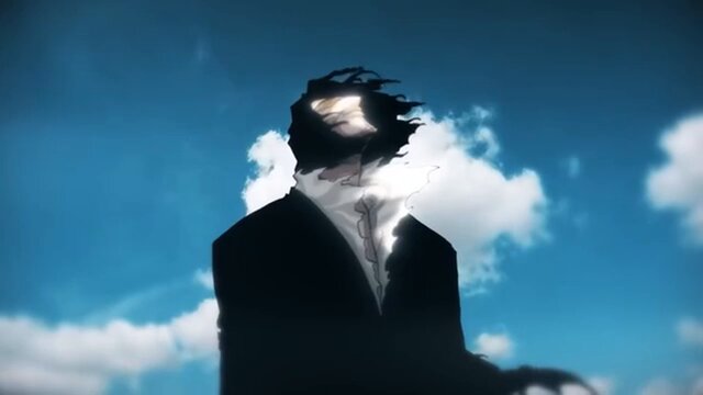 The image features a man wearing a suit standing against a blue sky with white clouds, giving off an air of mystery or intrigue. The man appears to be dressed for work, possibly as a businessman, while his hair is blowing in the wind. The background shows that he is outdoors and there are no other people visible in the photo.