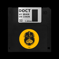 A black floppy disk labeled 'DOCT MY BRAIN ON CHAIN 1.44MB' featuring a yellow circular sticker with a vintage portrait.