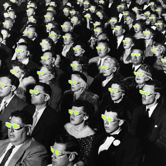 A black-and-white photo of a vintage movie theater audience wearing 3D glasses, with the lenses digitally tinted neon green to evoke a crypto/cultural buzz — perfectly matching the post's "green night, crypto family. see ya soon" vibe, suggesting a collective, ready-to-watch crypto crowd.