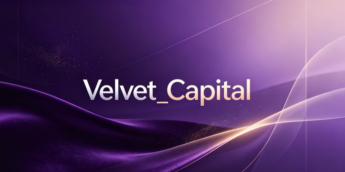 A purple gradient banner displaying the text 'Velvet_Capital' in white and gold lettering with flowing light effects.