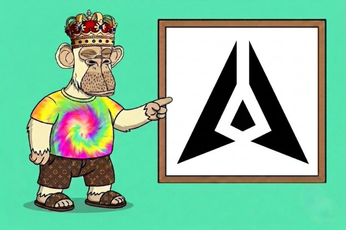 The image features a cartoon monkey wearing a tie-dye shirt with a crown on its head, standing next to a white board displaying an "a" symbol. The monkey appears to be pointing at something on the board or explaining the meaning of the symbol. The background is a light green color that complements the overall scene.
