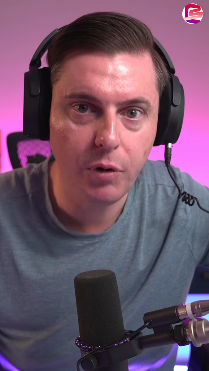The image shows a man wearing headphones, possibly at a gaming event or a podcast recording session. The man appears to be making a funny face for the camera while holding a microphone. In the background, there are two chairs visible, one near the left edge of the frame and another on the right side. A pink wall can also be seen in the image.

The post features an interesting connection between Bitcoin and XRP, suggesting that Bitcoin is now telling private wealth clients to buy XRP. This could potentially impact the value of Bitcoin as a cryptocurrency or influence people's decisions regarding their investments. The post emphasizes the importance of understanding how different digital assets can interact with each other in the market.