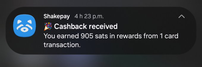 A Shakepay push notification reading: 'Cashback received. You earned 905 sats in rewards from 1 card transaction.'