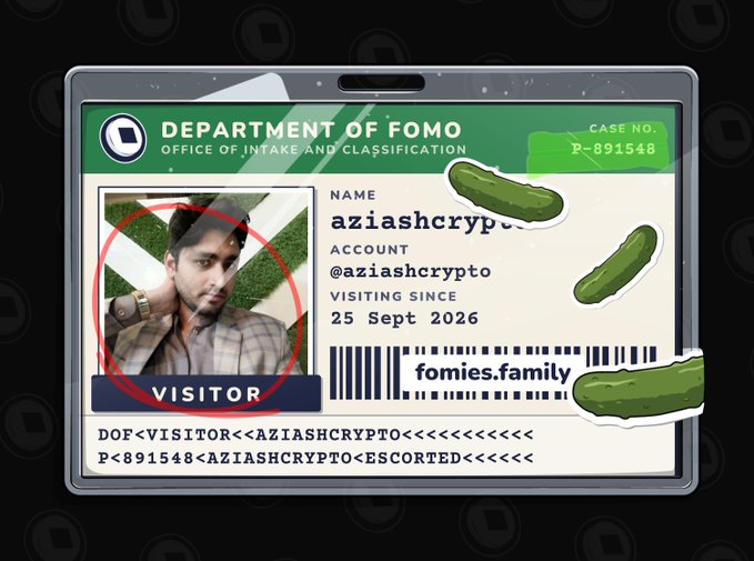 A digital ID card styled as a "Department of Fomo Office of Intake and Classification" visitor badge with Case No. P-891548, displaying the name "aziashcrypto" and account "@aziashcrypto" with a profile photo, decorated with pickle stickers and "fomies.family" branding.