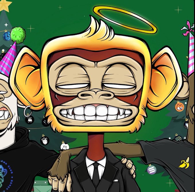 A cartoon NFT-style illustration of a smug-looking monkey in a black suit and red mask with a golden halo above its head, surrounded by festive ornaments and party hats on a green background.