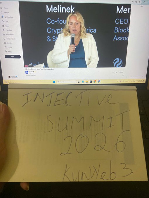 A laptop displays a virtual summit featuring 'Melinek, Co-founder, Cryptocurrency & [something]' while a handwritten sticky note reads 'INJECTIVE SUMMIT 2026 KyuWeb 3'.