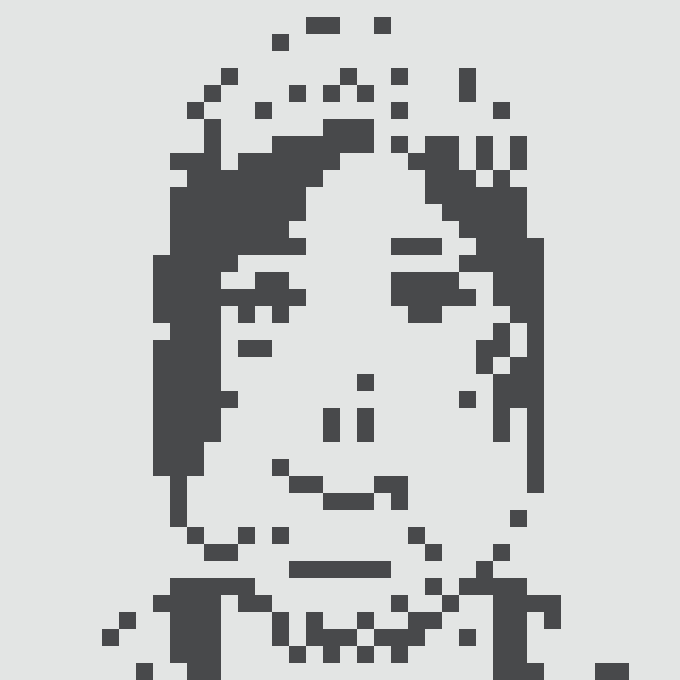 A low-resolution, pixelated black-and-white image of a woman's face and shoulders.