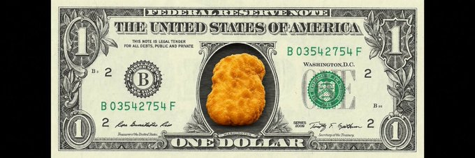 A digital edit of a United States one-dollar bill where the portrait in the center has been replaced with a chicken nugget.