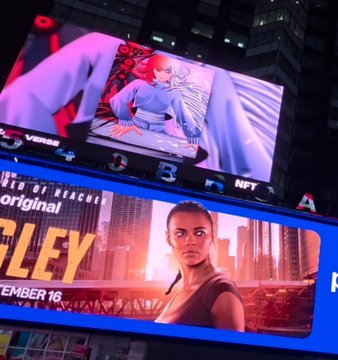 A nighttime photograph of bright billboards in a city, including a Versace ad, an NFL promo, and a poster for the Peacock series 'ORIGINAL' showing 'LEY' (likely 'WILD' or a similar title) with the date 'EMBER 16'.