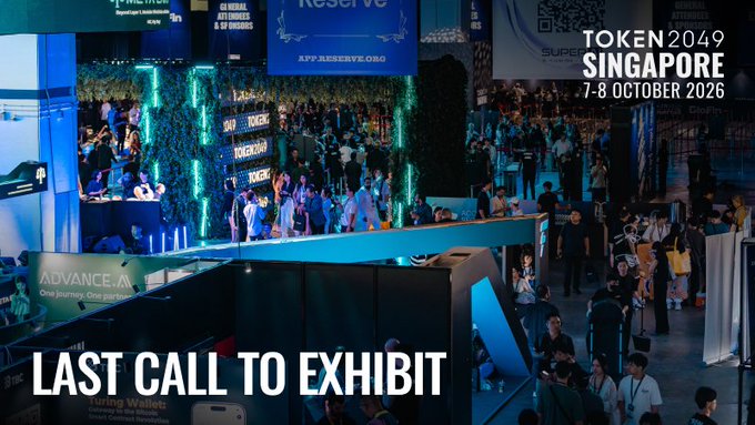 A crowded conference hall with attendees gathered around brightly lit booths, featuring promotional text "TOKEN 2049 SINGAPORE 7-8 OCTOBER 2026" and "LAST CALL TO EXHIBIT," tying into the post's announcement that ELLIPAL will be exhibiting at booth MB4-2 during the October 7-8 event.