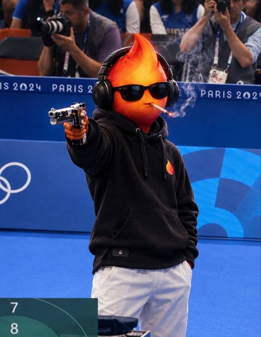 A digitally edited image showing a person with a flame emoji face, wearing sunglasses and headphones, holding a gun at the Paris 2024 Olympics venue.