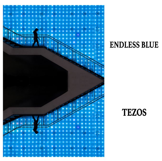 A silhouette of a person walking on stairs against a vibrant blue LED wall, with text reading "ENDLESS BLUE" and "TEZOS" on the right side.