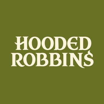 A logo image featuring the text "HOODED ROBBINS" in bold cream-colored lettering on an olive green background, likely serving as branding for the Hooded Robins NFT project mentioned among the upcoming NFT collections in the post.