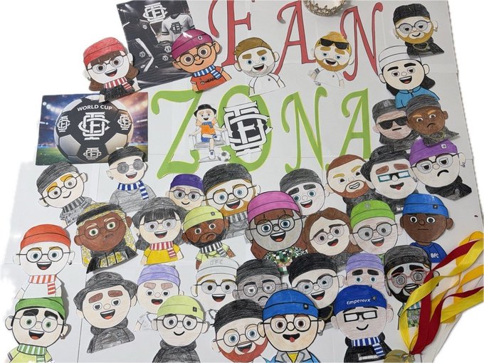 A hand-drawn poster titled 'FAN ZONA' filled with colorful illustrations of diverse soccer fans wearing team scarves and hats, including a black and white soccer ball design.