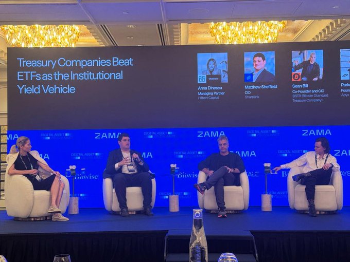 A panel discussion titled 'Treasury Companies Beat ETFs as the Institutional Yield Vehicle' featuring speakers from Hilbert Capital, ShapeShift, and BofA Treasury at a ZAMA event.