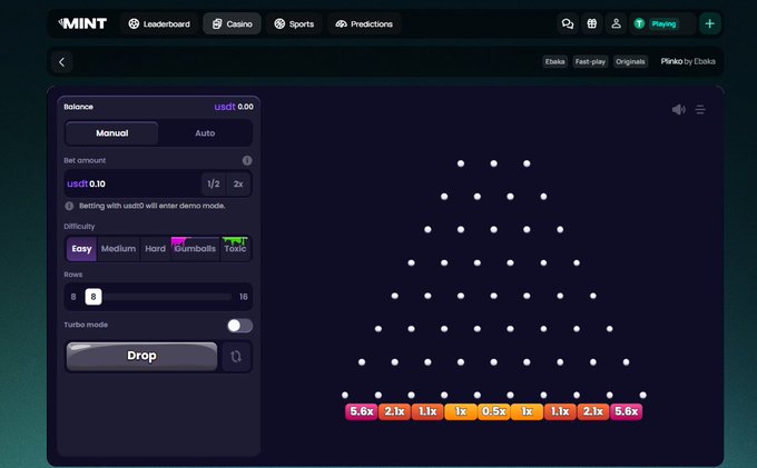 The MINT gaming platform's Plinko game interface, showing a pyramid of pegs with multipliers (5.6x, 2.1x, 1.1x, 1x, 0.5x, 1x, 1.1x, 2.1x, 5.6x) at the bottom and a 'Drop' button on the left panel.