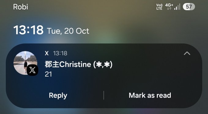An iPhone lock screen displaying the time 13:18 on Tuesday, 20 October, showing a notification from X (formerly Twitter) where user Christine (*,*) replied to the device owner named 'Robi'.