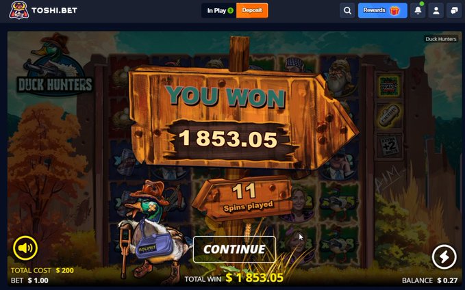 A screenshot from Tosh1.bet's "Duck Hunters" slot game displays a "YOU WON" popup showing a total win of $1,853.05 from 11 spins, with the poster celebrating a successful morning gambling session and offering to send a tip via SOL address.