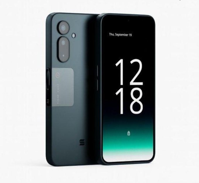 Two sleek, dark-colored smartphones are displayed side by side, with the device on the left showing its back featuring a dual-camera setup and "SOLANA MOBILE" branding, while the device on the right displays its front screen with the time "12:18" and date "Thu, September 19" against a teal gradient background. The image showcases the Solana Seeker phone, the model the post references in its $500 fundraising appeal to the Solana community.