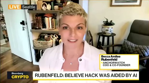 Becca Amilee Rubenfeld, COO and co-founder of AnchorWatch, appears on Bloomberg Crypto from Seattle, discussing her belief that a recent hack was aided by AI. The on-screen ticker "RUBENFELD: BELIEVE HACK WAS AIDED BY AI" highlights her key commentary on the intersection of cybersecurity and artificial intelligence.