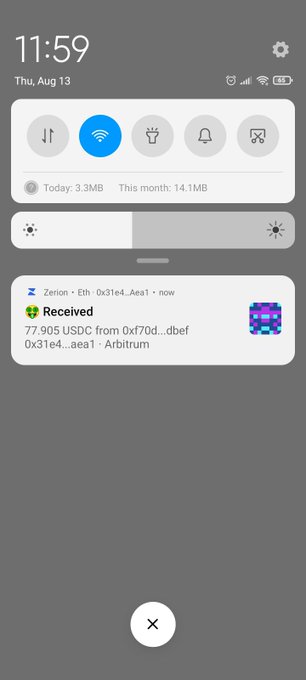 Android phone screenshot dated Thu, Aug 13 at 11:59, showing quick settings toggles, brightness slider, and a notification for receiving 77.905 USDC on the Zerion app via the Arbitrum network.