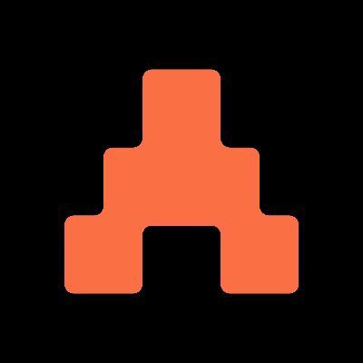 A simple orange castle/tower icon on a black background.