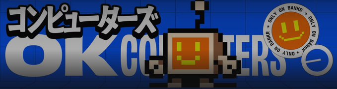The image features a blue banner with white text that says "OKC" written in Japanese, accompanied by an orange robot character. The robot has a smiley face and appears to be smiling at the viewer. The background of the image is gray, providing a neutral backdrop for the colorful elements on the banner.