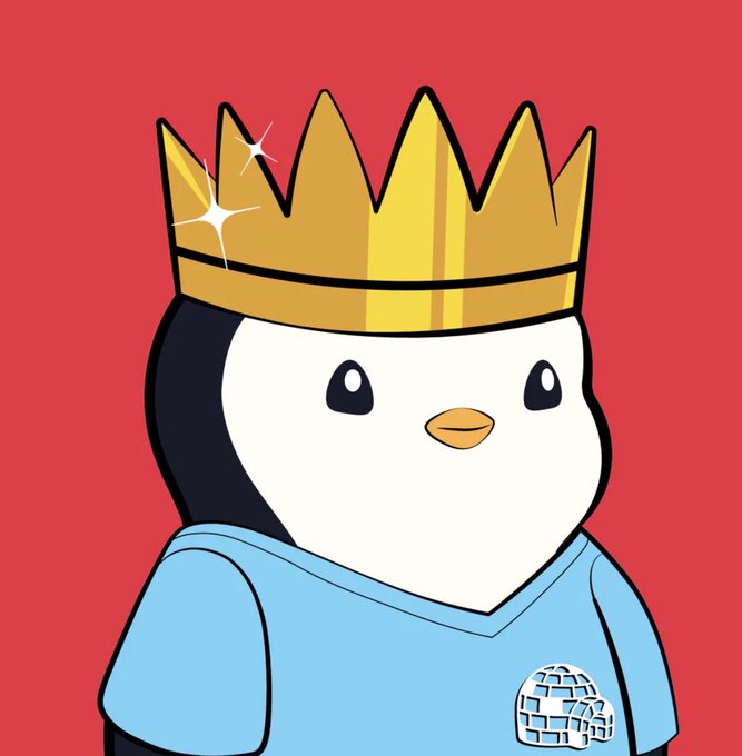 A cartoon illustration of a penguin wearing a gold crown and a light blue shirt with a disco ball emblem, set against a red background.