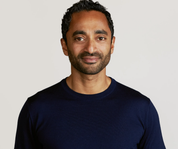 A headshot of Chamath Palihapitiya, the venture capitalist referenced in the post, wearing a navy blue sweater against a light background.
