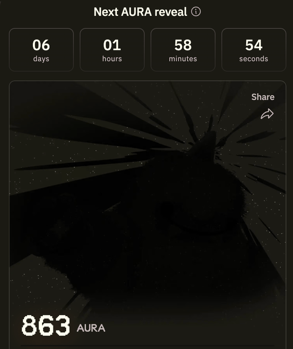 A countdown timer for "Next AURA reveal" showing 06 days, 01 hours, 58 minutes, 54 seconds remaining, with a dark shattered glass background and "863 AURA" displayed at the bottom.