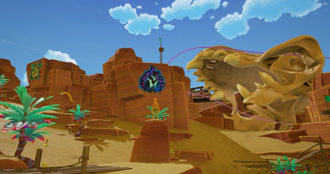 A video game screenshot depicting a vibrant desert canyon environment with a large skeletal creature head, a portal, a tower with a flame, and palm trees in the foreground.