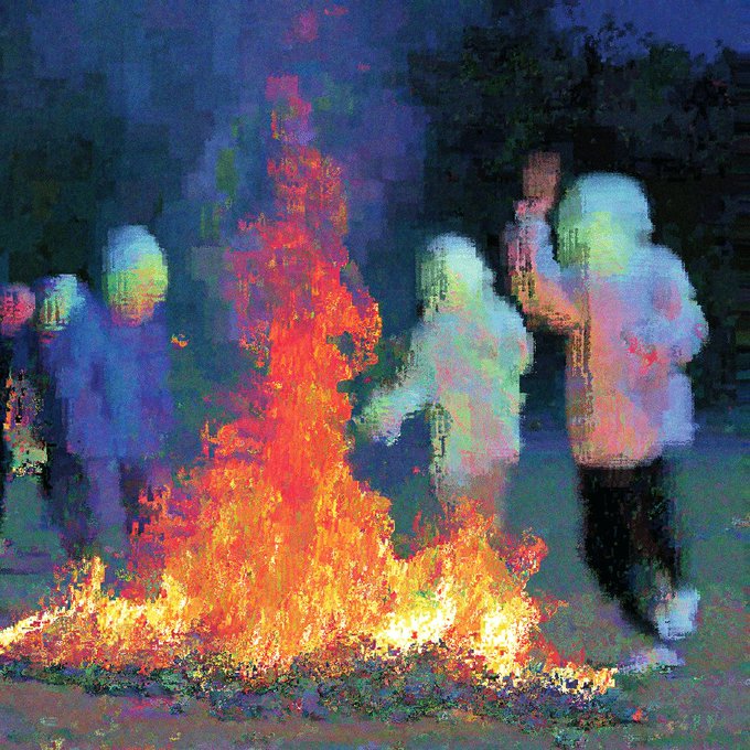 A vibrant, impressionistic painting shows several ghostly figures gathered around a blazing bonfire, with the intense orange and red flames contrasting against a deep blue twilight background. The artwork, titled "Luminous Trick" by BlvnkNow on objkt.com, uses fiery digital brushstrokes to capture the glowing warmth of the fire illuminating the silhouetted people around it.