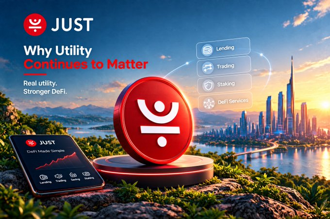 A promotional graphic for 'JUST' cryptocurrency featuring a large red coin logo on a pedestal, with text reading 'Why Utility Continues to Matter' and 'Real utility. Stronger DeFi.', listing Lending, Trading, Staking, and DeFi Services against a futuristic cityscape.