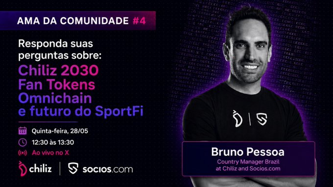 The image features a man standing against a purple background, smiling for the camera. The text "Ama da Communidade" is displayed at the top of the image, indicating that this photo was taken during an event organized by Chiliz. The main focus of the image is on the man's face and his smile, which suggests he might be sharing a positive experience or message related to the event.