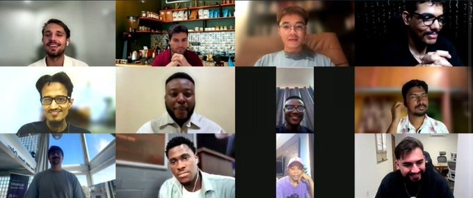 A 4x3 grid of video call participants, appearing to be a group meeting or panel discussion with twelve different people in various indoor settings.