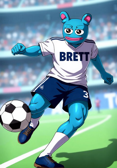 ikidoo, a blue-eyed monster with a pink nose and mouth, kicks a soccer ball on a green field while wearing a white jersey with the name Brett.