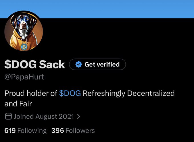 A Twitter profile page for "$DOG Sack" (@PapaHurt) featuring a Doberman avatar wearing a Bitcoin hoodie, with the bio "Proud holder of $DOG Refreshingly Decentralized and Fair."