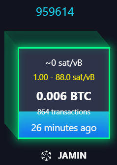 A digital graphic displays a Bitcoin transaction block with the text '959614', '~0 sat/vB', '1.00 - 88.0 sat/vB', '0.006 BTC', '864 transactions', '26 minutes ago', and the label 'JAMIN'.