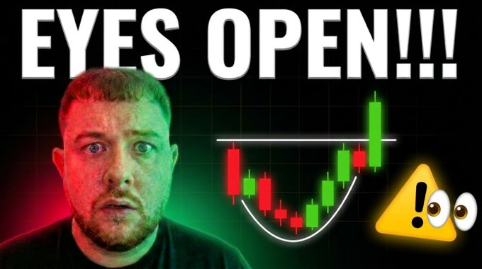 The image features a man with an intense, wide-eyed stare alongside the text "EYES OPEN!!!" and a candlestick chart displaying a pattern with a horizontal resistance line, visually representing a warning for Bitcoin buyers. The thumbnail supports the video's cautionary message to wait before buying BTC.