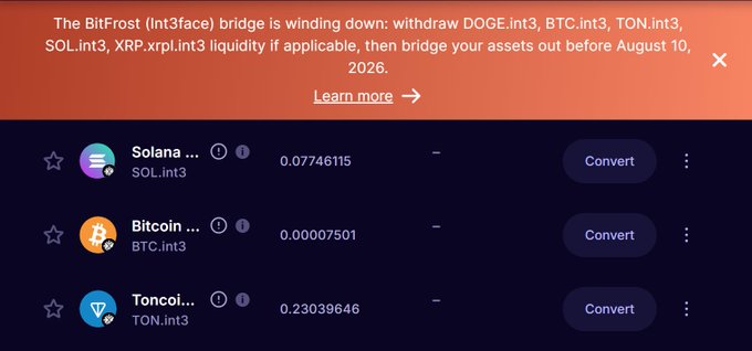 A cryptocurrency wallet interface displays an urgent orange alert banner warning that the BitFrost (Int3face) bridge is winding down, instructing users to withdraw DOGE.int3, BTC.int3, TON.int3, SOL.int3, and XRP.xrpl.int3 liquidity and bridge assets out before August 10, 2026, alongside balances for Solana (0.07746115 SOL.int3), Bitcoin (0.00007501 BTC.int3), and Toncoin (0.23039646 TON.int3) tokens. The image illustrates the new targeted warning system referenced in the post, showing how the alert banner appears specifically for wallets holding the Int3face assets facing imminent shutdown.